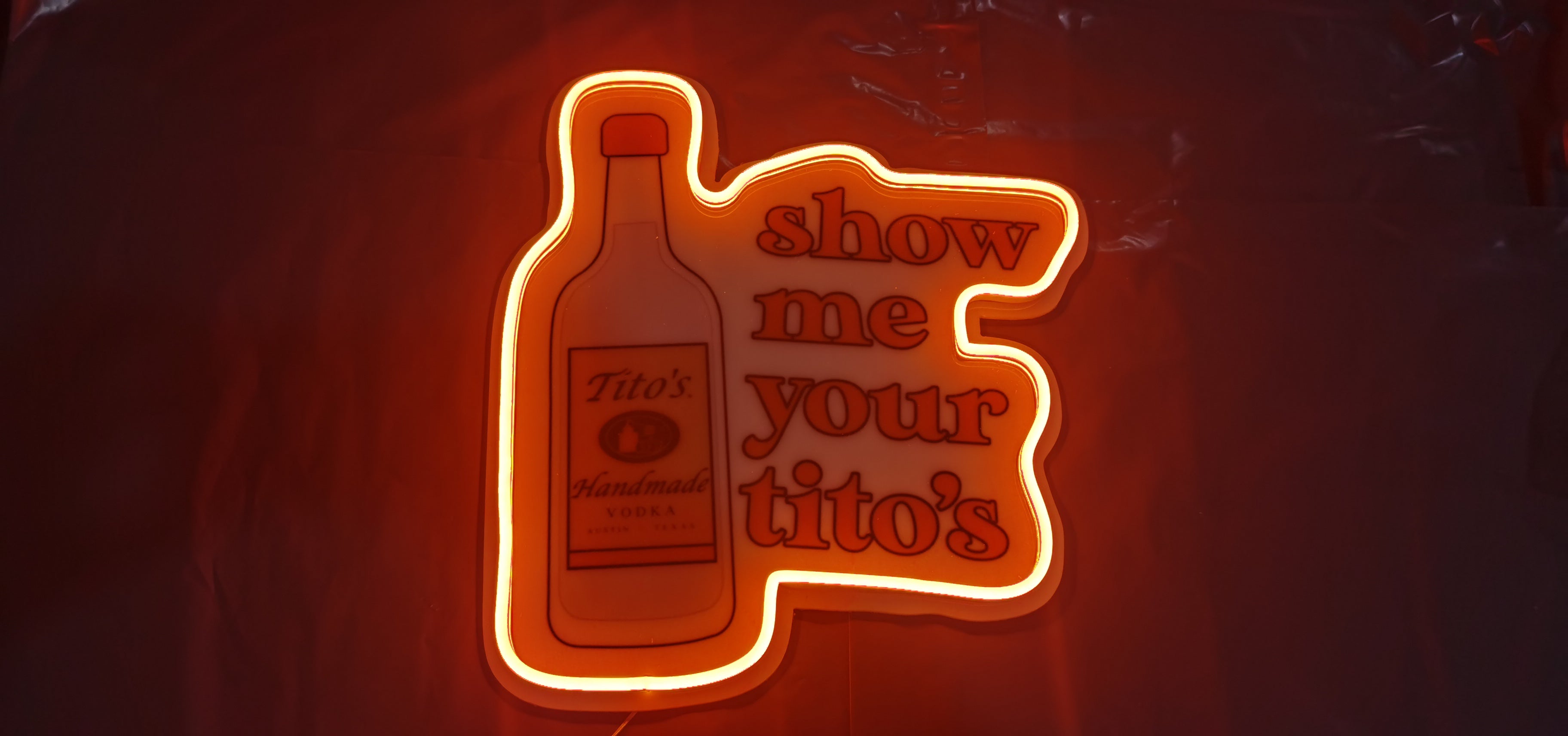 Tito's vodka signs