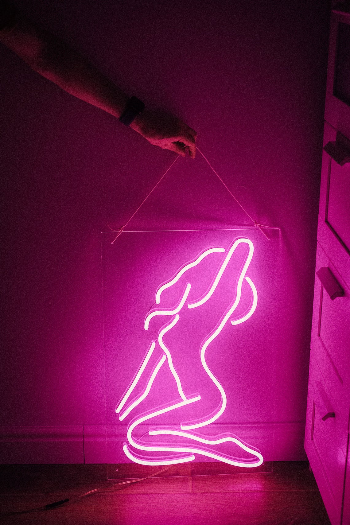 Sexy girl woman pink neon sign for bar, night club, party, erotic striptease